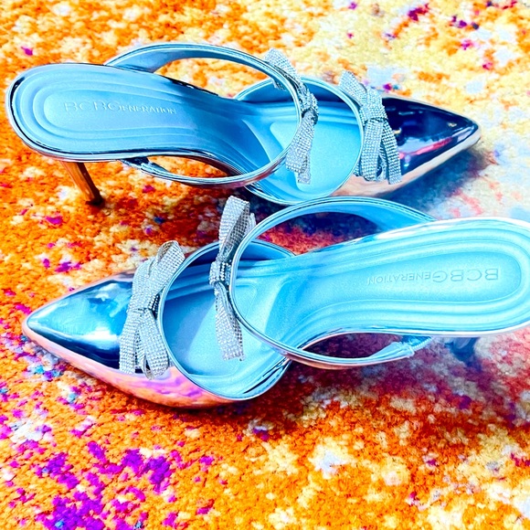 New BCBGeneration
Bardia Metallic Patent Rhinestone Bows Dress Mules - Picture 10 of 13